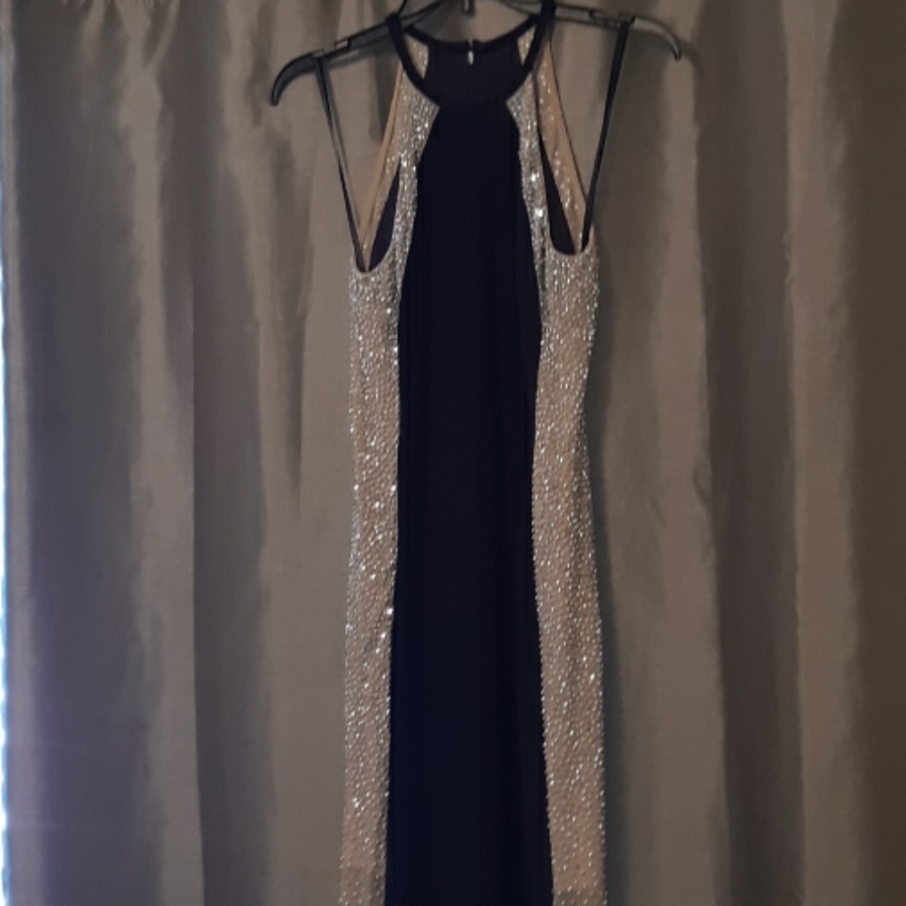 An Evening Gown, New, without tags.